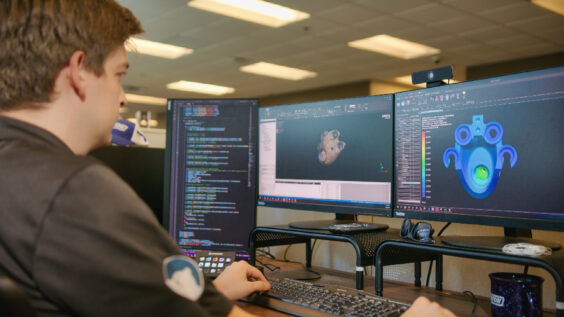 Horton engineers reviewing Horton fan clutch paired with OEM trucking manufacturer application